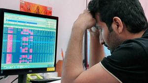 A broker reacts to the crash at the BSE Sensex.(PTI Photo) A broker reacts to the crash at the BSE Sensex.(PTI Photo)