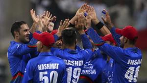 Afghanistan's Mohammad Nabi, left, celebrates with teammates the dismissal of Sri Lanka's captain Angelo Mathews.(AP) Afghanistan's Mohammad Nabi, left, celebrates with teammates the dismissal of Sri Lanka's captain Angelo Mathews.(AP)