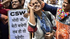 Protestors raise slogans during a protest against the alleged gang rape of a 19-year-old CBSE topper in Rewari outside Haryana Bhawan in New Delhi, Monday, Sept. 17, 2018.(PTI) Protestors raise slogans during a protest against the alleged gang rape of a 19-year-old CBSE topper in Rewari outside Haryana Bhawan in New Delhi, Monday, Sept. 17, 2018.(PTI)