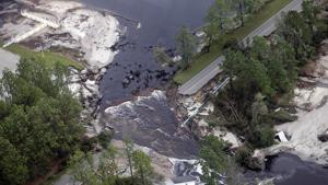 Rain-gorged rivers threatened further flooding on the storm-battered US East Coast Monday as the death toll from Hurricane Florence, now a tropical depression, jumped to 31.(AP File Photo) Rain-gorged rivers threatened further flooding on the storm-battered US East Coast Monday as the death toll from Hurricane Florence, now a tropical depression, jumped to 31.(AP File Photo)