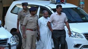 Bishop Franco Mulakkal (2nd right), accused of raping a nun, is pictured outside a crime branch office on the outskirts of Kochi in Kerala.(Reuters Photo) Bishop Franco Mulakkal (2nd right), accused of raping a nun, is pictured outside a crime branch office on the outskirts of Kochi in Kerala.(Reuters Photo)