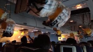 Oxygen masks are seen deployed after a loss of cabin pressure, on a Jet Airways flight, from Mumbai, in this still image obtained from social media.(Reuters Photo) Oxygen masks are seen deployed after a loss of cabin pressure, on a Jet Airways flight, from Mumbai, in this still image obtained from social media.(Reuters Photo)