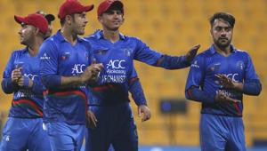 Afghanistan's Rashid Khan, right, leaves the field with teammates after their win in the one day international cricket match of Asia Cup between Bangladesh and Afghanistan in Abu Dhabi, United Arab Emirates(AP) Afghanistan's Rashid Khan, right, leaves the field with teammates after their win in the one day international cricket match of Asia Cup between Bangladesh and Afghanistan in Abu Dhabi, United Arab Emirates(AP)