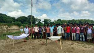 Villagers and family members of the two victims, Rajesh Sarkar, 19, and Tapash Burman, 21, have refused to cremate the bodies.(HT Photo) Villagers and family members of the two victims, Rajesh Sarkar, 19, and Tapash Burman, 21, have refused to cremate the bodies.(HT Photo)