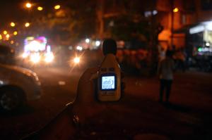 Sarita Khanchandani, the founder of NGO Hirali Foundation, holds up a sound meter to measure noise levels in Ulhasnagar.(HT Photo) Sarita Khanchandani, the founder of NGO Hirali Foundation, holds up a sound meter to measure noise levels in Ulhasnagar.(HT Photo)