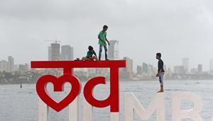 Children climb on "I LOVE MUMBAI" installation at Bandra Reclamation.(Satyabrata Tripathy/HT Photo) Children climb on "I LOVE MUMBAI" installation at Bandra Reclamation.(Satyabrata Tripathy/HT Photo)