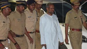 Bishop Franco Mulakkal (2nd R), accused of raping a nun, is escorted by police outside a crime branch office on the outskirts of Kochi in Kerala.(Reuters Photo) Bishop Franco Mulakkal (2nd R), accused of raping a nun, is escorted by police outside a crime branch office on the outskirts of Kochi in Kerala.(Reuters Photo)