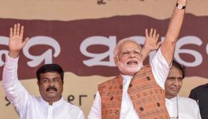 Prime Minister Narendra Modi with Petroleum Minister Dharmendra Pradhan waves at the crowd at a public meeting after the inauguration of Jharsuguda airport in Odisha, Saturday, September 22, 2018.(PTI) Prime Minister Narendra Modi with Petroleum Minister Dharmendra Pradhan waves at the crowd at a public meeting after the inauguration of Jharsuguda airport in Odisha, Saturday, September 22, 2018.(PTI)