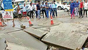 Drilling of the road had weakened its surface, said officials.(HT PHOTO) Drilling of the road had weakened its surface, said officials.(HT PHOTO)