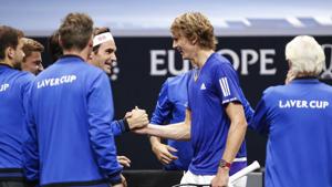 Team Europe's Alexander Zverev, second from right, is congratulated by Rodger Federer after defeating Team World's John Isner at the Laver Cup tennis event, Saturday, Sept. 22, 2018, in Chicago. (AP Photo/Kamil Krzaczynski)(AP) Team Europe's Alexander Zverev, second from right, is congratulated by Rodger Federer after defeating Team World's John Isner at the Laver Cup tennis event, Saturday, Sept. 22, 2018, in Chicago. (AP Photo/Kamil Krzaczynski)(AP)