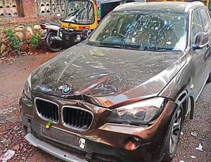 Police said the BMW also rammed into another car before crashing into the bike.(HT PHOTO) Police said the BMW also rammed into another car before crashing into the bike.(HT PHOTO)