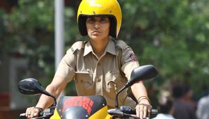 A woman police constable patrols on a Motor Bike at the South Campus Delhi University.(HT File Photo) A woman police constable patrols on a Motor Bike at the South Campus Delhi University.(HT File Photo)