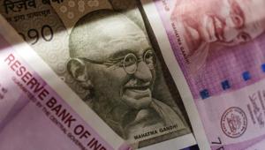 The rupee struggled to make headway after a two-day climb and backtracked to end sharply lower by 43 paise to 72.63 against the US dollar after crude prices soared ahead of impending US sanctions on Iran.(Bloomberg) The rupee struggled to make headway after a two-day climb and backtracked to end sharply lower by 43 paise to 72.63 against the US dollar after crude prices soared ahead of impending US sanctions on Iran.(Bloomberg)