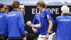 Team Europe's Alexander Zverev, second from right, is congratulated by Roger Federer at Laver Cup 2018.(AP) Team Europe's Alexander Zverev, second from right, is congratulated by Roger Federer at Laver Cup 2018.(AP)