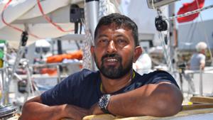 India's skipper Abhilash Tomy poses on his boat "Thuriya" in Les Sables d'Olonne Harbour, ahead of the solo around-the-world sailing race for the "Golden Globe Race" ocean race in which sailors compete without high technology aides such as GPS or computers.(AFP File Photo) India's skipper Abhilash Tomy poses on his boat "Thuriya" in Les Sables d'Olonne Harbour, ahead of the solo around-the-world sailing race for the "Golden Globe Race" ocean race in which sailors compete without high technology aides such as GPS or computers.(AFP File Photo)
