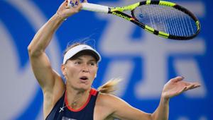 Caroline Wozniacki of Denmark hits a return against Rebecca Peterson of Sweden during their women's singles third round match of the WTA Wuhan Open tennis tournament in Wuhan(AFP) Caroline Wozniacki of Denmark hits a return against Rebecca Peterson of Sweden during their women's singles third round match of the WTA Wuhan Open tennis tournament in Wuhan(AFP)