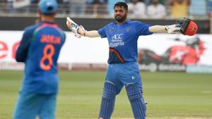Afghan batsman Mohammad Shahzad celebrates after scoring a century against India at the Dubai International Cricket Stadium.(AFP) Afghan batsman Mohammad Shahzad celebrates after scoring a century against India at the Dubai International Cricket Stadium.(AFP)