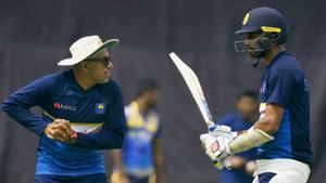 Sri Lanka'S Dasun Shanaka (R) and coach Chandika Hathurusingha (L) speak during a training session at the Pallekele International Cricket Stadium(AFP) Sri Lanka'S Dasun Shanaka (R) and coach Chandika Hathurusingha (L) speak during a training session at the Pallekele International Cricket Stadium(AFP)
