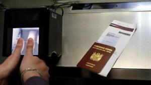 A man has his fingerprints electronically taken while taking part in a visa application demonstration at the Embassy of the United States in Lima.(Reuters File Photo) A man has his fingerprints electronically taken while taking part in a visa application demonstration at the Embassy of the United States in Lima.(Reuters File Photo)