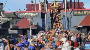 Devotees wait at Lord Ayyappa temple, in Sabarimala.(PTI File Photo) Devotees wait at Lord Ayyappa temple, in Sabarimala.(PTI File Photo)