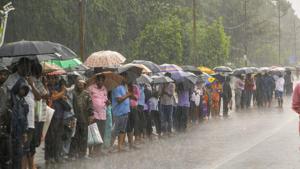 School and college teachers under the banner of Odisha School College Teachers and Employees United Forum (OSCTEUF) stage a protest in the rain against the government over their demands, in Bhubaneswar, Thursday, Sept 20, 2018.(PTI) School and college teachers under the banner of Odisha School College Teachers and Employees United Forum (OSCTEUF) stage a protest in the rain against the government over their demands, in Bhubaneswar, Thursday, Sept 20, 2018.(PTI)