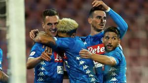 Napoli's Polish striker Arkadiusz Milik (L) celebrates with teammates after scoring during the Italian Serie A football match between SSC Napoli and Parma Calcio 1913 on September 26, 2018, at the San Paolo Stadium in Naples.(AFP) Napoli's Polish striker Arkadiusz Milik (L) celebrates with teammates after scoring during the Italian Serie A football match between SSC Napoli and Parma Calcio 1913 on September 26, 2018, at the San Paolo Stadium in Naples.(AFP)