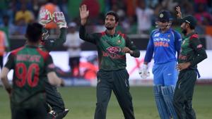 Bangladesh players celebrate the fall of an India wicket.(AFP) Bangladesh players celebrate the fall of an India wicket.(AFP)