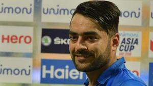 Afghan cricketer Rashid Khan poses with his award of 'Player Of The Match' after victory in the one day international (ODI) Asia Cup cricket match between Bangladesh and Afghanistan at The Sheikh Zayed Stadium in Abu Dhabi on September 20, 2018. - Afghanistan won by 136 runs. (Photo by ISHARA S. KODIKARA / AFP)(AFP) Afghan cricketer Rashid Khan poses with his award of 'Player Of The Match' after victory in the one day international (ODI) Asia Cup cricket match between Bangladesh and Afghanistan at The Sheikh Zayed Stadium in Abu Dhabi on September 20, 2018. - Afghanistan won by 136 runs. (Photo by ISHARA S. KODIKARA / AFP)(AFP)