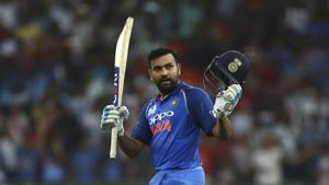 Dubai: India's captain Rohit Sharma raises his bat and helmet to celebrate scoring a century during the one day international cricket match of Asia Cup between India and Pakistan in Dubai.(AP) Dubai: India's captain Rohit Sharma raises his bat and helmet to celebrate scoring a century during the one day international cricket match of Asia Cup between India and Pakistan in Dubai.(AP)