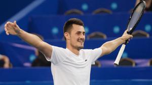 Bernard Tomic of Australia reacts after winning his men's singles match against Fabio Fognini.(AFP) Bernard Tomic of Australia reacts after winning his men's singles match against Fabio Fognini.(AFP)
