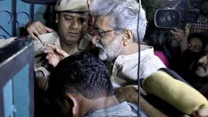 Human rights activist Gautam Navlakha at his residence after he was arrested by the Pune police in connection with the Bhima Koregaon violence, in New Delhi on Tuesday.(PTI File Photo) Human rights activist Gautam Navlakha at his residence after he was arrested by the Pune police in connection with the Bhima Koregaon violence, in New Delhi on Tuesday.(PTI File Photo)
