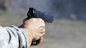 Police said the accused waylaid the woman in the lane outside her house and shot her. Despite being shot, she managed to run away and lock herself in a neighbour’s house.(Reuters File / Representative Image) Police said the accused waylaid the woman in the lane outside her house and shot her. Despite being shot, she managed to run away and lock herself in a neighbour’s house.(Reuters File / Representative Image)