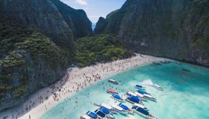 Maya Bay, ringed by cliffs on Ko Phi Phi Ley island, was made famous when it featured in the 2000 film starring Leonardo DiCaprio.(Unsplash) Maya Bay, ringed by cliffs on Ko Phi Phi Ley island, was made famous when it featured in the 2000 film starring Leonardo DiCaprio.(Unsplash)