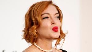 Lindsay Lohan poses at the 70th Cannes Film Festival. Lindsay Lohan poses at the 70th Cannes Film Festival.