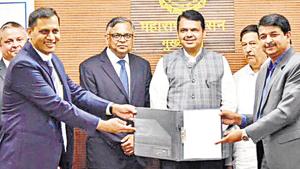 CM Fadnavis (fourth from left) hands over the metro contract to Tata-Siemens joint venture in the presence of guardian minister Girish Bapat (second from right) and PMRDA CEO Kiran Gitte (right).(HT PHOTO) CM Fadnavis (fourth from left) hands over the metro contract to Tata-Siemens joint venture in the presence of guardian minister Girish Bapat (second from right) and PMRDA CEO Kiran Gitte (right).(HT PHOTO)