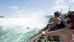 A family looks as the Maid of the Mist turns around at Niagara Falls.(AP File Photo) A family looks as the Maid of the Mist turns around at Niagara Falls.(AP File Photo)