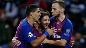 Barcelona striker Lionel Messi (C) celebrates with teammates after scoring their third goal against Tottenham.(AFP) Barcelona striker Lionel Messi (C) celebrates with teammates after scoring their third goal against Tottenham.(AFP)