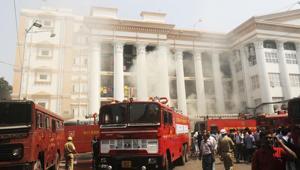 Fire fighters douse a fire which broke out in a pharmacy building of the Kolkata Medical College and Hospital, in Kolkata on October 3.(Samir Jana/ HT Photo) Fire fighters douse a fire which broke out in a pharmacy building of the Kolkata Medical College and Hospital, in Kolkata on October 3.(Samir Jana/ HT Photo)