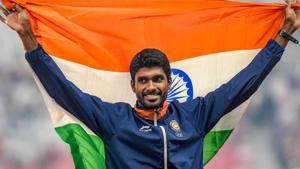 Jinson Johnson celebrates during the medal ceremony for the men's 1500m event in Jakarta.(PTI) Jinson Johnson celebrates during the medal ceremony for the men's 1500m event in Jakarta.(PTI)