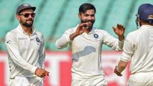 Rajkot: Indian bowler Ravindra Jadeja (C) celebrates the wicket of West Indies batsman Sunil Ambris as team captain Virat Kohli (L) looks on, during their first test cricket match, in Rajkot.(PTI) Rajkot: Indian bowler Ravindra Jadeja (C) celebrates the wicket of West Indies batsman Sunil Ambris as team captain Virat Kohli (L) looks on, during their first test cricket match, in Rajkot.(PTI)