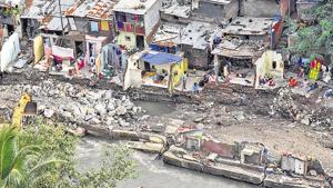 Broken walls and shattered homes is all that remains for the slum dwellers near Dandekar bridge.(HT PHOTO Sanket Wankhade) Broken walls and shattered homes is all that remains for the slum dwellers near Dandekar bridge.(HT PHOTO Sanket Wankhade)