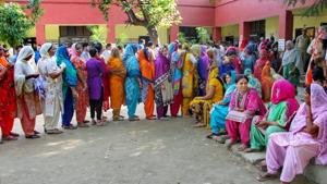People wait in a queue to cast their votes at a polling station during municipal elections in Jammu, on Monday.(PTI) People wait in a queue to cast their votes at a polling station during municipal elections in Jammu, on Monday.(PTI)