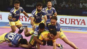 Chennai: Players of Tamil Thalaivas (Yellow Blue) and Patna Pirates (Yellow Green) in action during their opening match of Pro Kabaddi league season6 in Chennai, Sunday, Oct. 7, 2018. (PTI Photo/R Senthil Kumar)(PTI10_7_2018_000165A)(AP) Chennai: Players of Tamil Thalaivas (Yellow Blue) and Patna Pirates (Yellow Green) in action during their opening match of Pro Kabaddi league season6 in Chennai, Sunday, Oct. 7, 2018. (PTI Photo/R Senthil Kumar)(PTI10_7_2018_000165A)(AP)