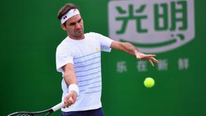 Roger Federer of Switzerland hits a return as he takes part in a training session at the Shanghai Masters tennis tournament.(AFP) Roger Federer of Switzerland hits a return as he takes part in a training session at the Shanghai Masters tennis tournament.(AFP)