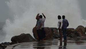 High speed winds from a cyclone cause waves to crash on the shore. The Andhra coast has been put on alert for the oncoming cyclone Titli, which is expected to make landfall tomorrow morning.(File Photo) High speed winds from a cyclone cause waves to crash on the shore. The Andhra coast has been put on alert for the oncoming cyclone Titli, which is expected to make landfall tomorrow morning.(File Photo)