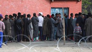 People stand in queue to cast their vote in Inderkoot, Bandipora district.(Waseem Andrabi/ HT Photo) People stand in queue to cast their vote in Inderkoot, Bandipora district.(Waseem Andrabi/ HT Photo)