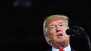 US President Donald Trump speaks during a US President Donald Trump speaks during a