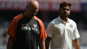 Indian cricketer Shardul Thakur (R) walks back with physio during the first day's play of the second Test cricket match between India and West Indies(AFP) Indian cricketer Shardul Thakur (R) walks back with physio during the first day's play of the second Test cricket match between India and West Indies(AFP)