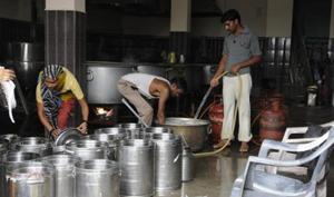 Mid day meal being prepared for an Anganwadi school in New Delhi, July 18. Much like many other schemes, Anganwadi too faces a problem of inadequate resource allocation. In the Anganwadi and ICDS at least <span class='webrupee'>₹</span>34,575 crores should be allocated as against the expenditure of <span class='webrupee'>₹</span>14,632 crores in 2016-17.(HT) Mid day meal being prepared for an Anganwadi school in New Delhi, July 18. Much like many other schemes, Anganwadi too faces a problem of inadequate resource allocation. In the Anganwadi and ICDS at least <span class='webrupee'>₹</span>34,575 crores should be allocated as against the expenditure of <span class='webrupee'>₹</span>14,632 crores in 2016-17.(HT)