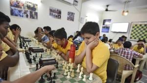 Children learning chess at Matrix Chess Academy at Maliviya Nagar, in New Delhi.(Burhaan Kinu/HT PHOTO)